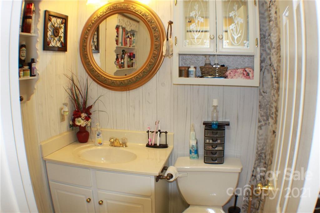 128 Cameron Drive Rutherfordton, NC 28139 - Photo 17 of 48 a bathroom with a toilet and a sink