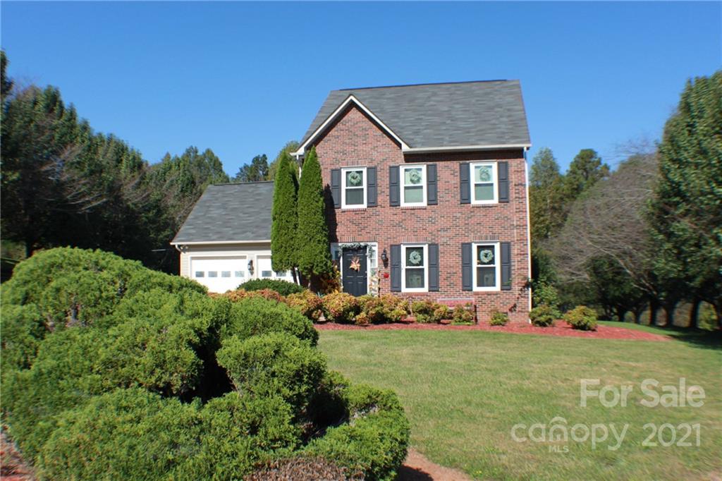 128 Cameron Drive Rutherfordton, NC 28139 - Photo 38 of 48 a front view of a house with garden