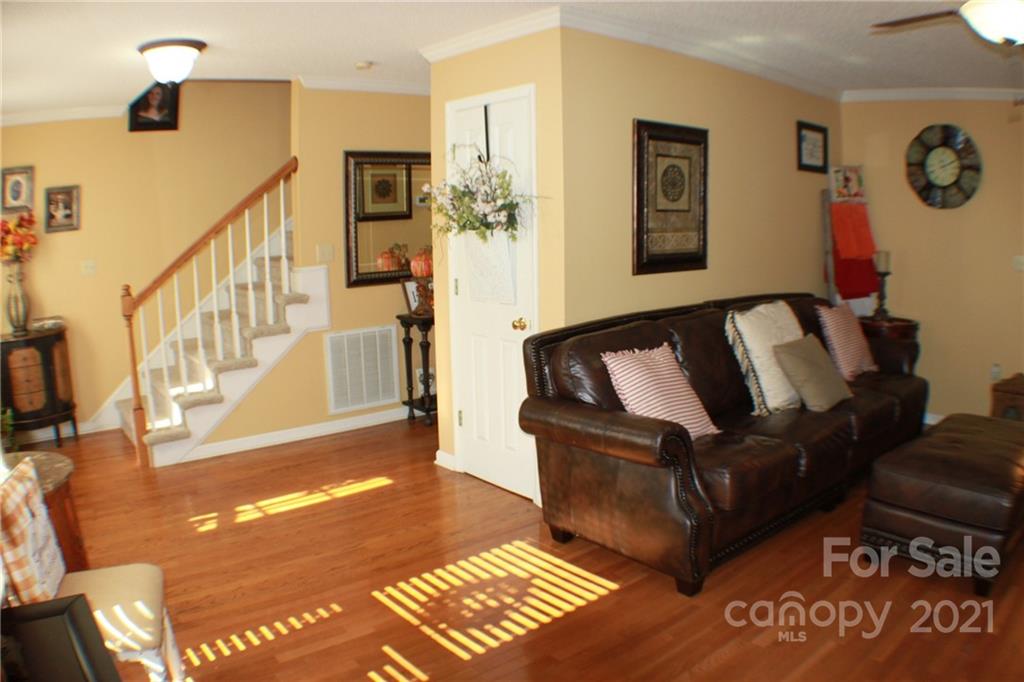 128 Cameron Drive Rutherfordton, NC 28139 - Photo 5 of 48 a living room with furniture and a rug