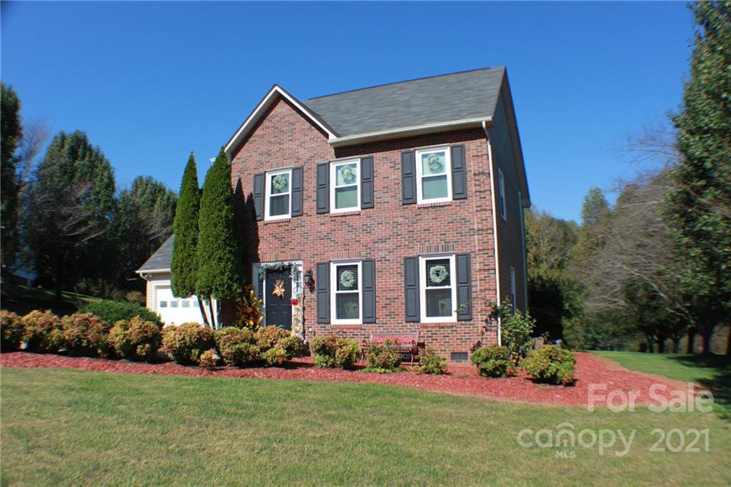 128 Cameron Drive Rutherfordton, NC 28139 - Photo 42 of 48 a front view of a house with a yard