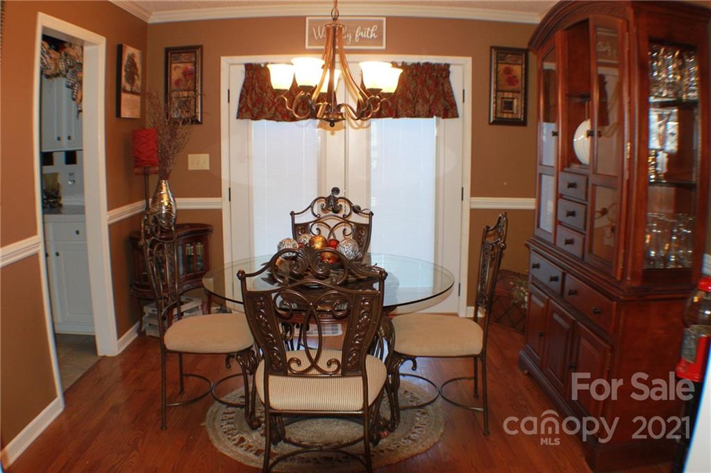 128 Cameron Drive Rutherfordton, NC 28139 - Photo 8 of 48 a view of a dining room with furniture
