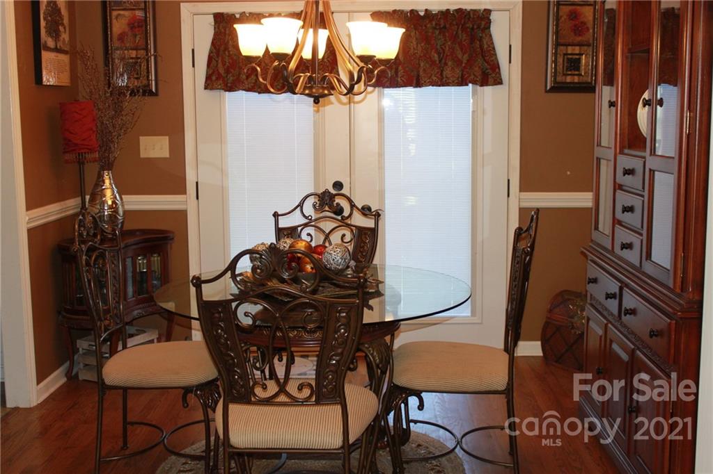 128 Cameron Drive Rutherfordton, NC 28139 - Photo 9 of 48 a view of a room with furniture and a kitchen