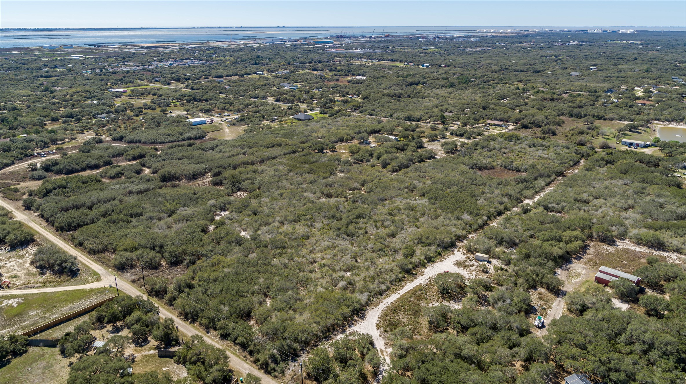 13 Rhodes Avenue Aransas Pass, TX 78336 - Photo 14 of 37 an aerial view of forest
