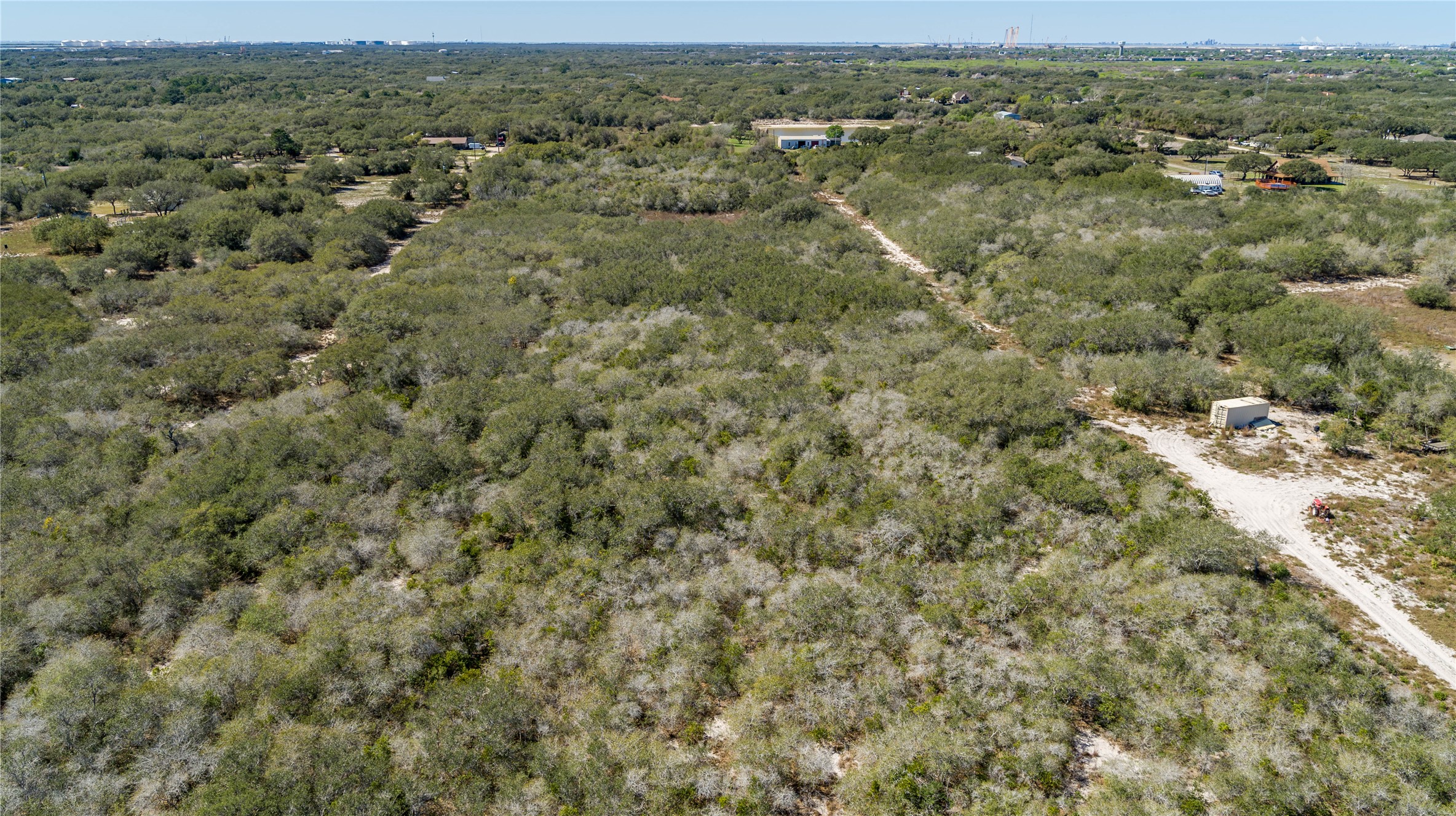 13 Rhodes Avenue Aransas Pass, TX 78336 - Photo 16 of 37 an aerial view of residential houses with outdoor space and trees