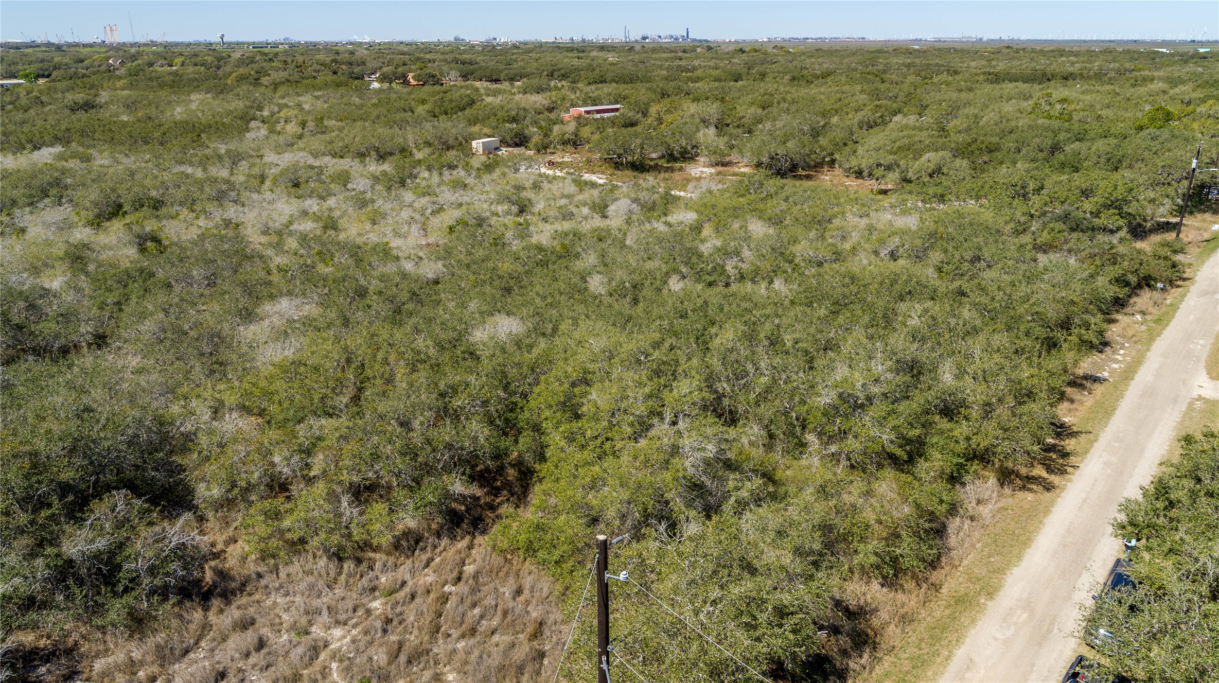 13 Rhodes Avenue Aransas Pass, TX 78336 - Photo 19 of 37 a view of a field with an ocean view