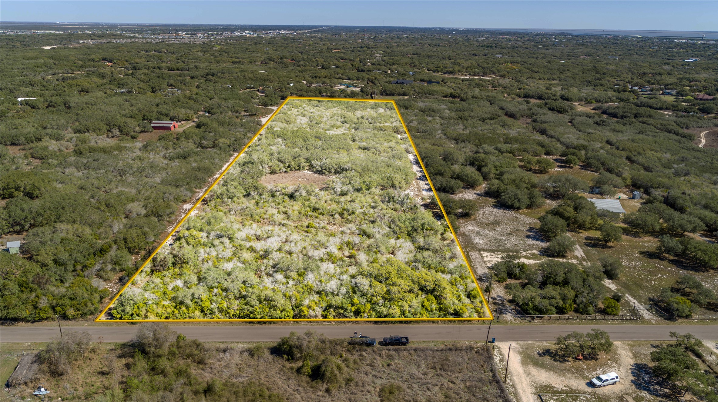 13 Rhodes Avenue Aransas Pass, TX 78336 - Photo 2 of 37 an aerial view of residential houses with outdoor space