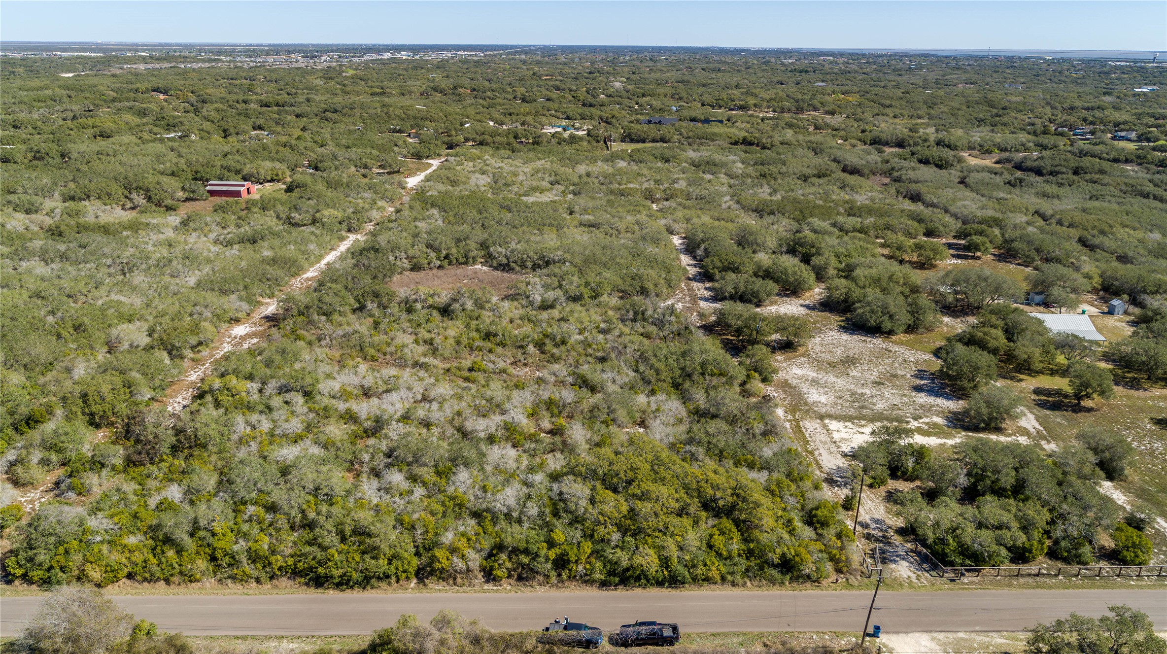 13 Rhodes Avenue Aransas Pass, TX 78336 - Photo 3 of 37 an aerial view of residential houses with outdoor space