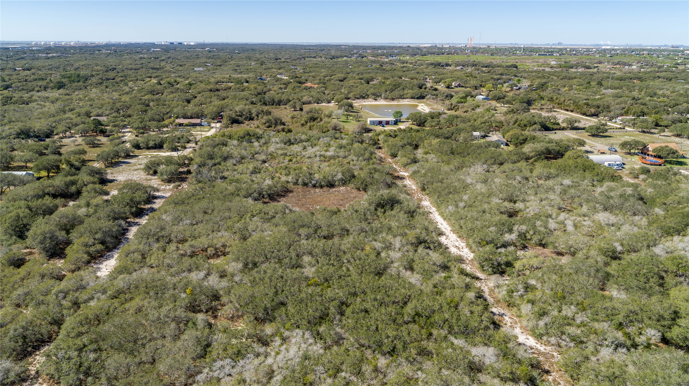 13 Rhodes Avenue Aransas Pass, TX 78336 - Photo 4 of 37 an aerial view of residential houses with outdoor space