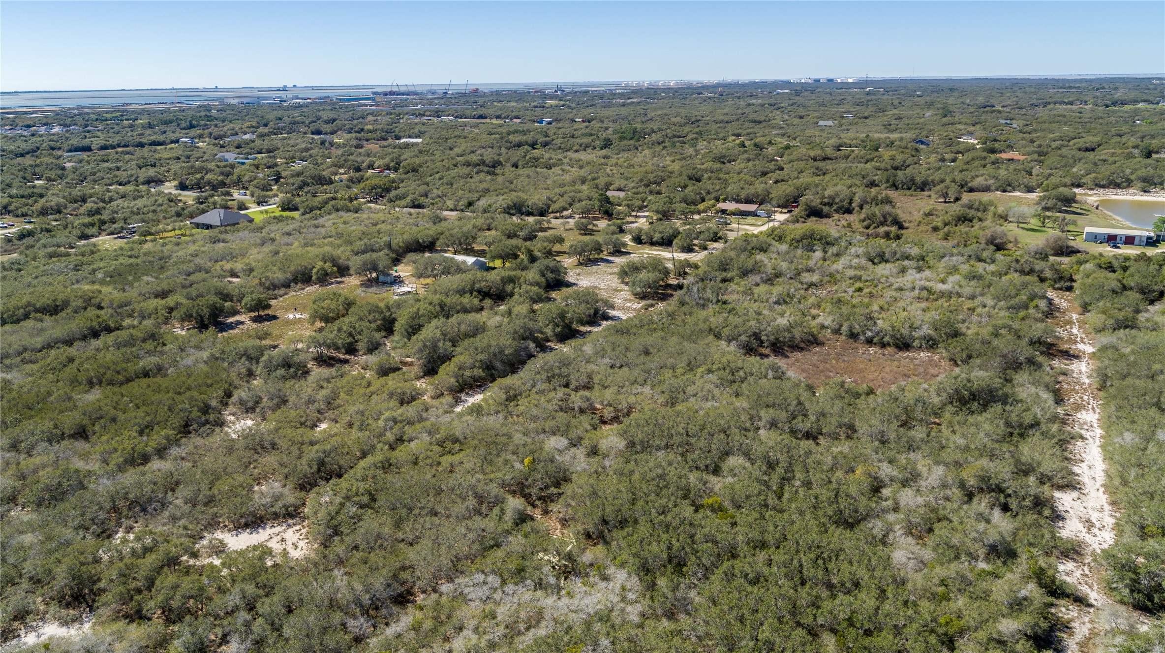 13 Rhodes Avenue Aransas Pass, TX 78336 - Photo 5 of 37 an aerial view of residential houses with outdoor space