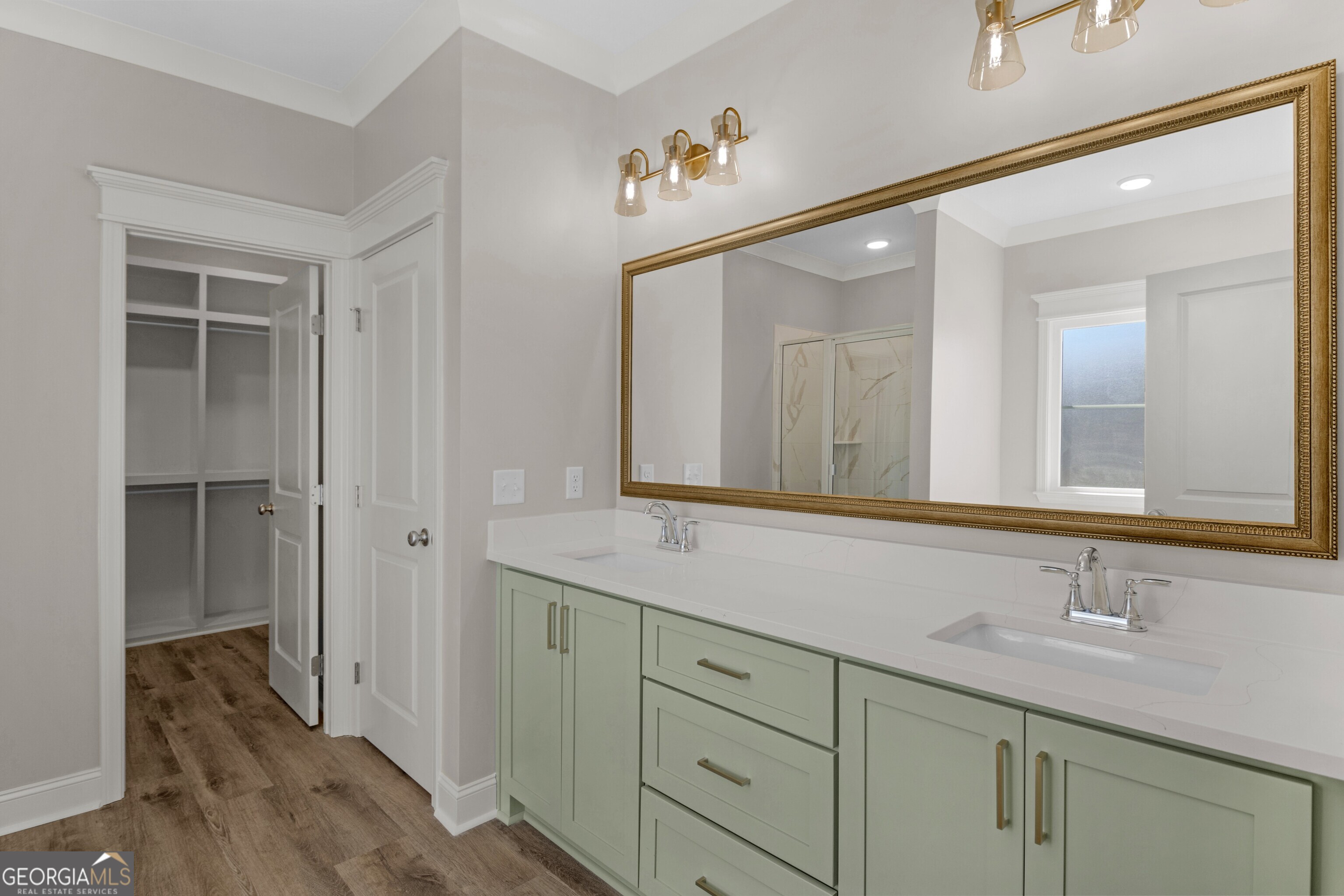 7 Honeysuckle Way Claxton, GA 30417 - Photo 16 of 31 a bathroom with a sink and a mirror