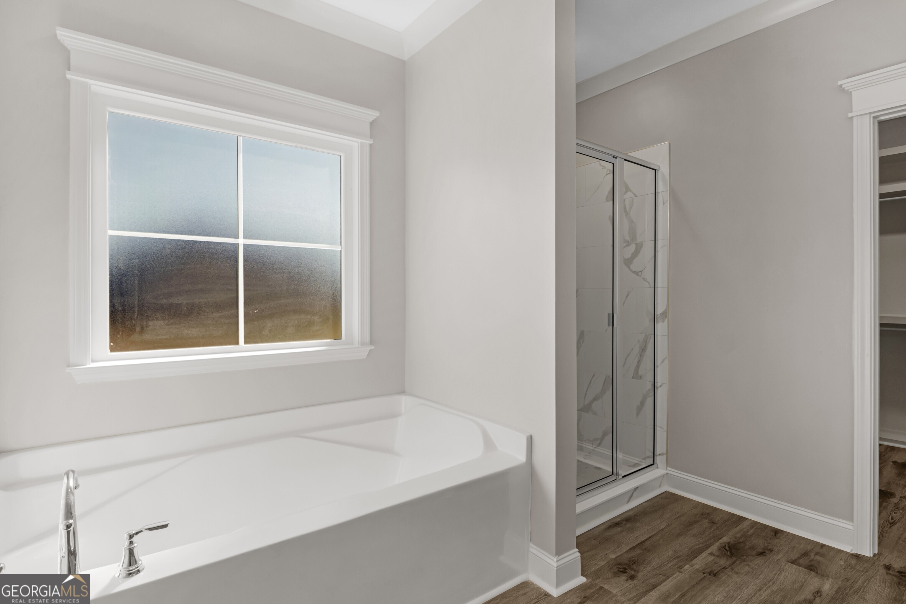 7 Honeysuckle Way Claxton, GA 30417 - Photo 17 of 31 a bathroom with a bathtub and shower