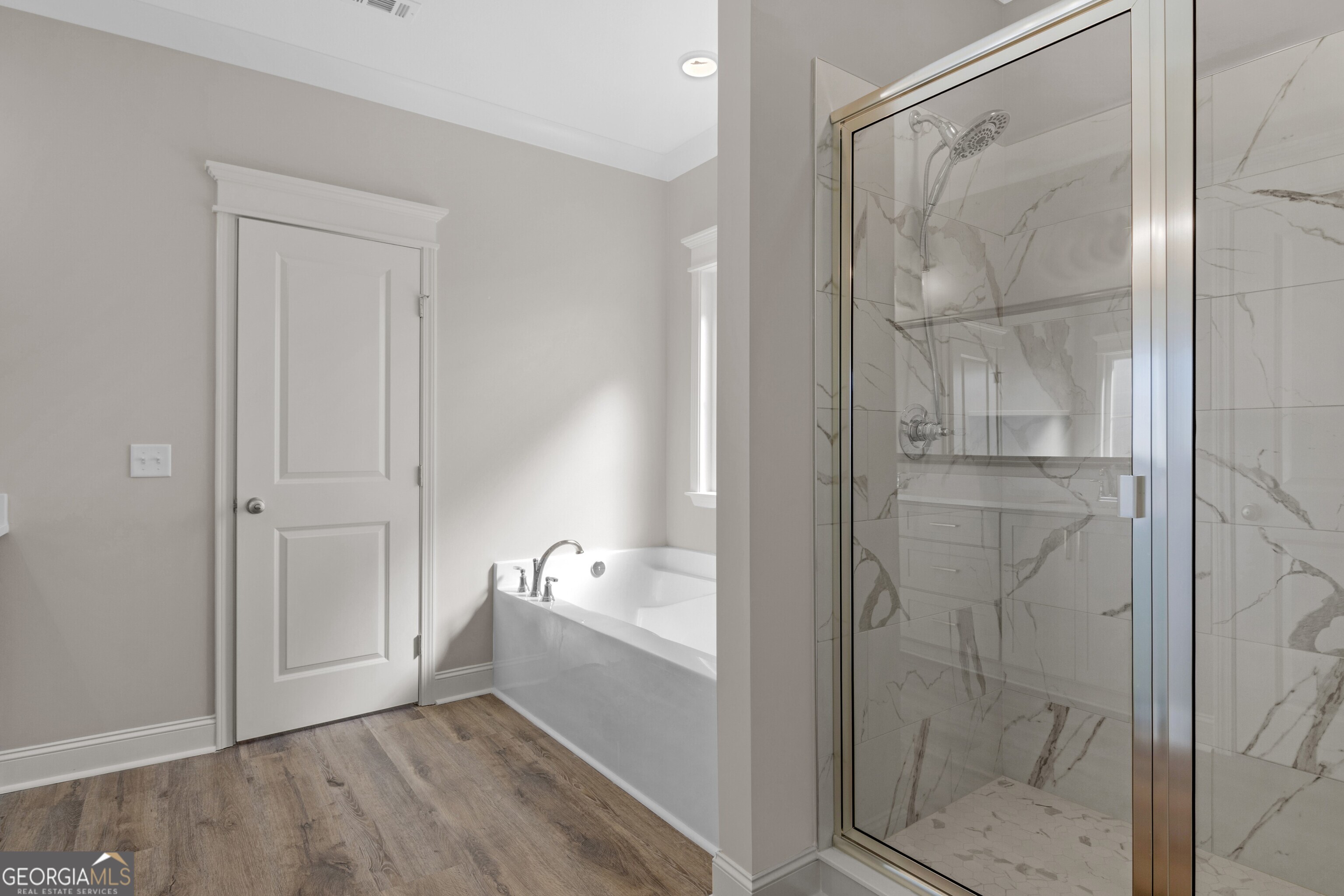 7 Honeysuckle Way Claxton, GA 30417 - Photo 18 of 31 a bathroom with a shower and a sink