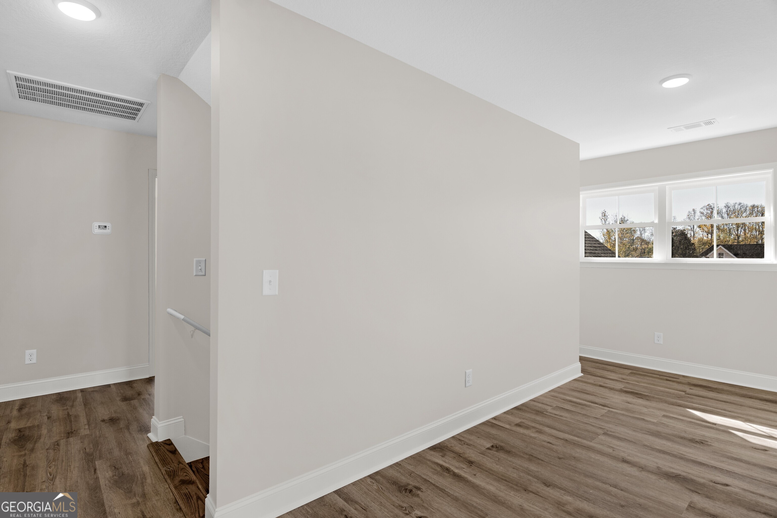 7 Honeysuckle Way Claxton, GA 30417 - Photo 23 of 31 a view of a room with wooden floor and closet