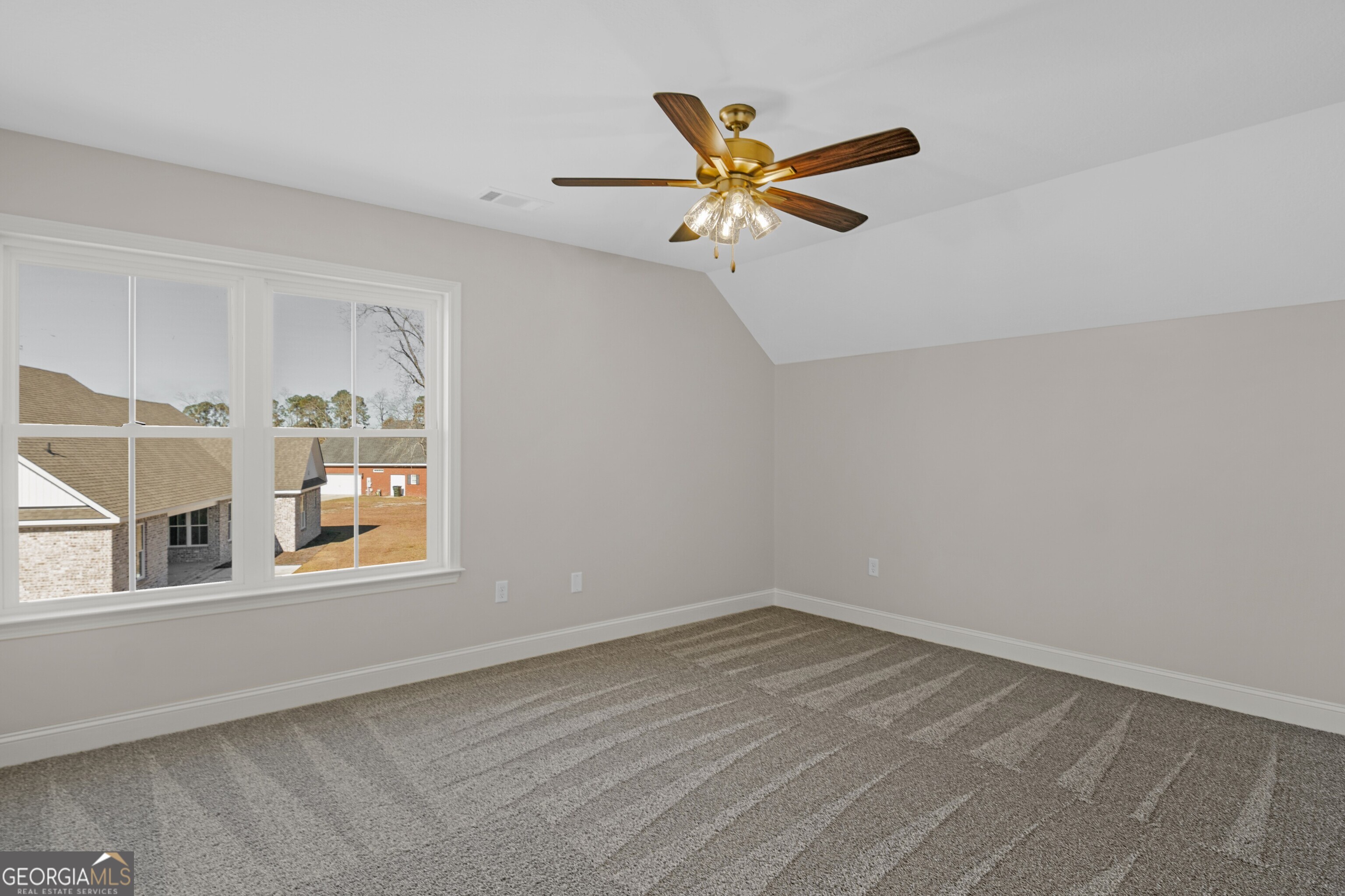 7 Honeysuckle Way Claxton, GA 30417 - Photo 26 of 31 a view of a livingroom with a ceiling fan and window
