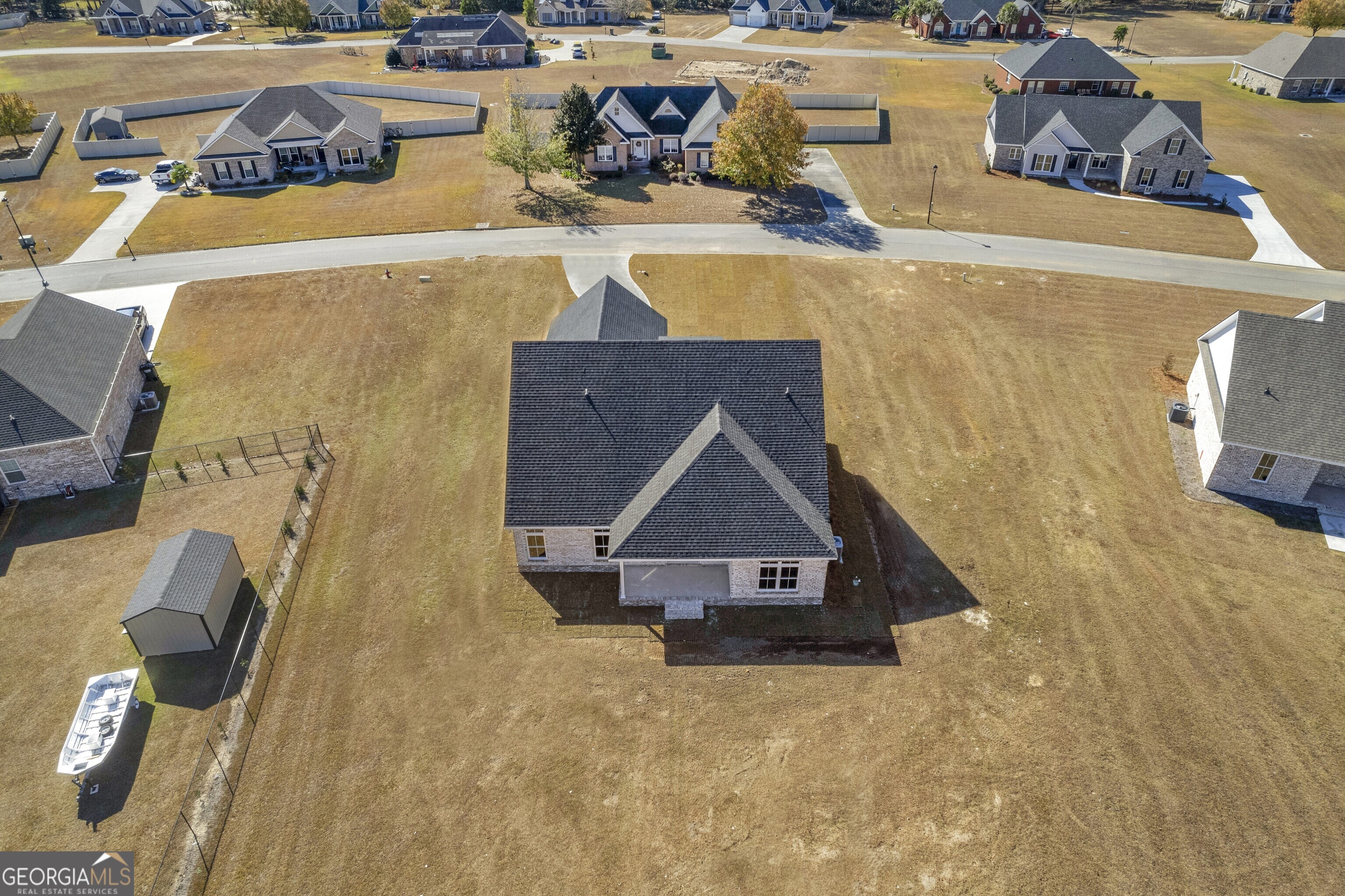 7 Honeysuckle Way Claxton, GA 30417 - Photo 31 of 31 an aerial view of a house with swimming pool