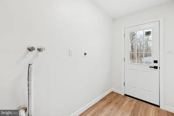 a view of small space with wooden floor