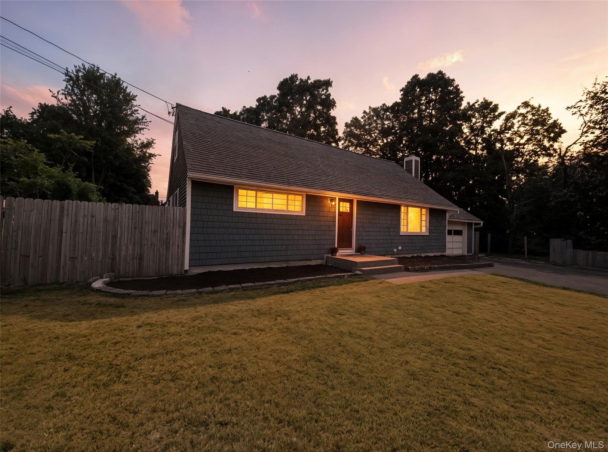 Ranch-style house with driveway