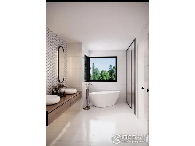 a living room with furniture and white walls