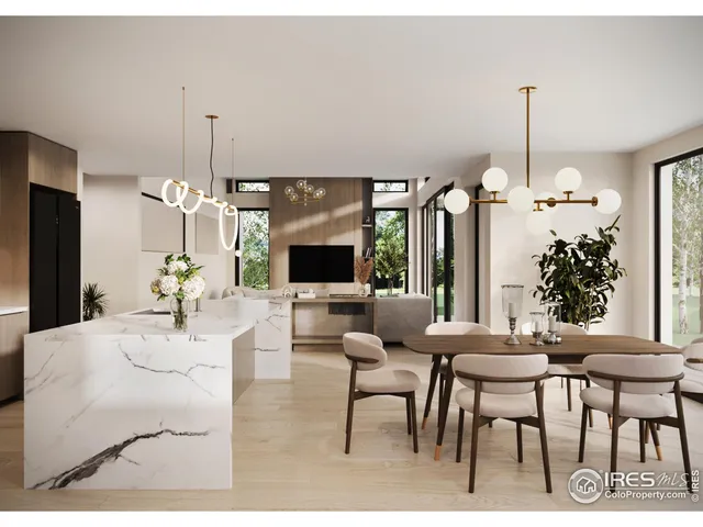 a dining room with furniture a chandelier and window
