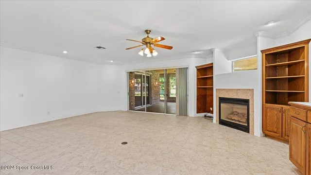a kitchen with stainless steel appliances a refrigerator and a stove top oven