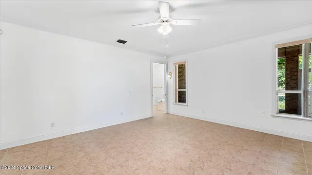 a bathroom with a shower and a toilet