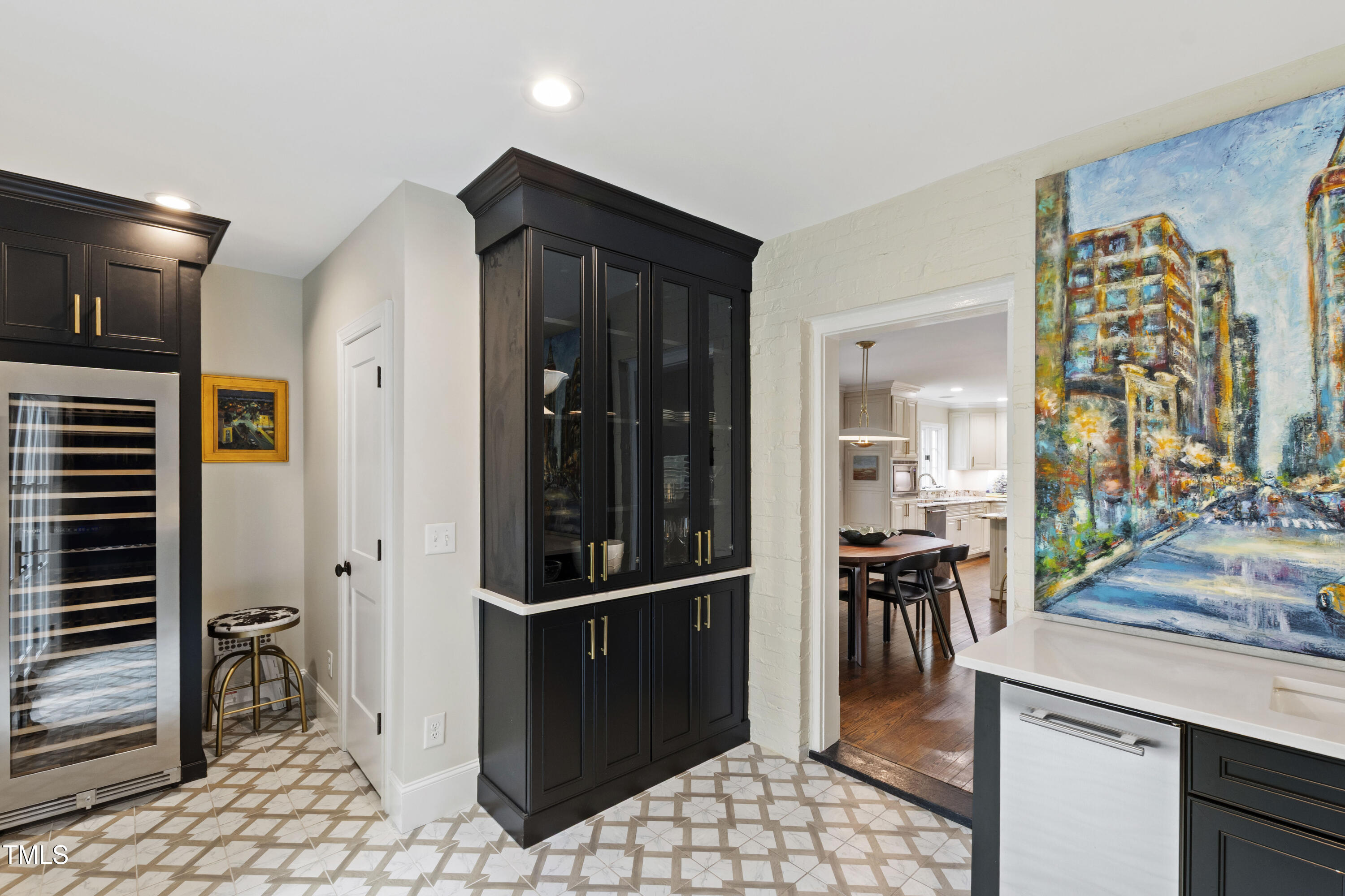 2610 Wells Avenue Raleigh, NC 27608 - Photo 27 of 64 a view of a hallway and dining room