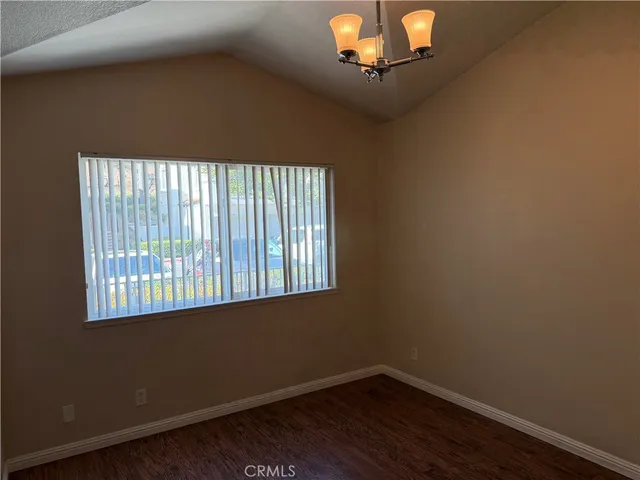 a bathroom with a granite countertop shower a sink and a mirror