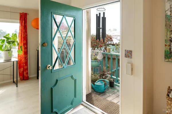 a living room with furniture and a rug