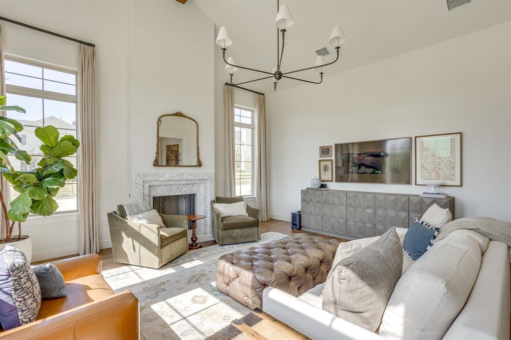 14000 Rozana Street Fort Worth, TX 76008 - Photo 7 of 38 a living room with furniture and a fireplace