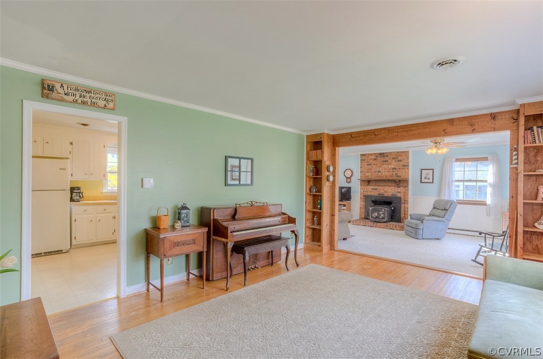 4716 Wedgemere Road Chesterfield, VA 23832 - Photo 2 of 18 a view of a livingroom with furniture and wooden floor