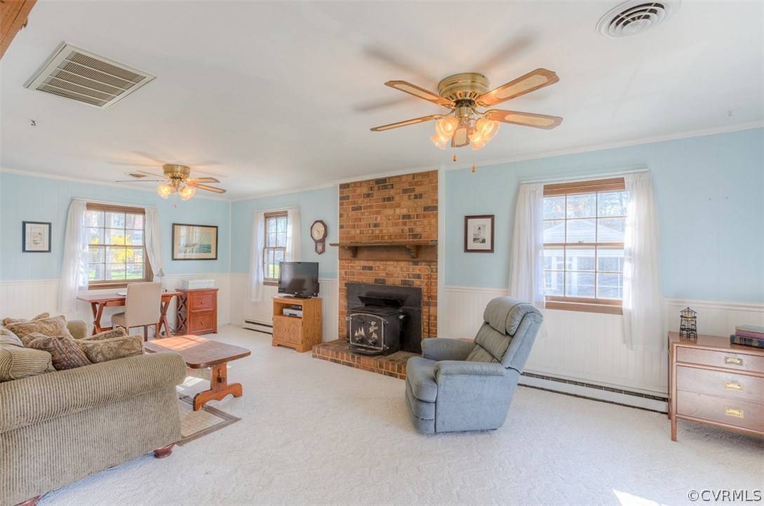 4716 Wedgemere Road Chesterfield, VA 23832 - Photo 4 of 18 a living room with furniture a fireplace and a window