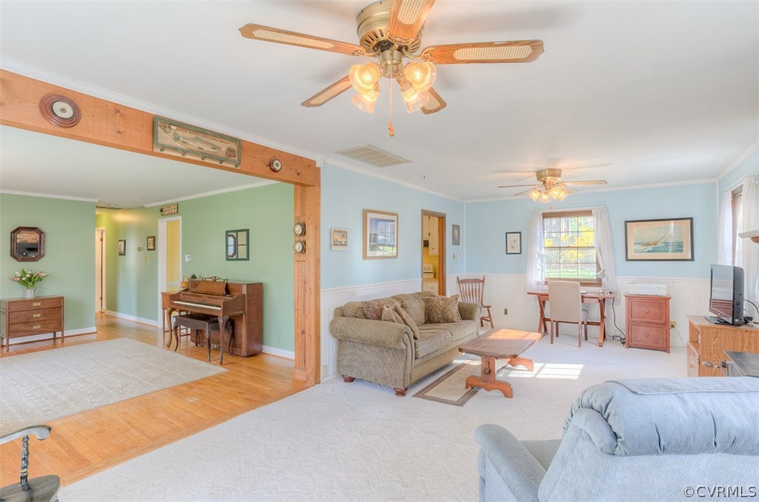 4716 Wedgemere Road Chesterfield, VA 23832 - Photo 5 of 18 a living room with furniture and a dining table
