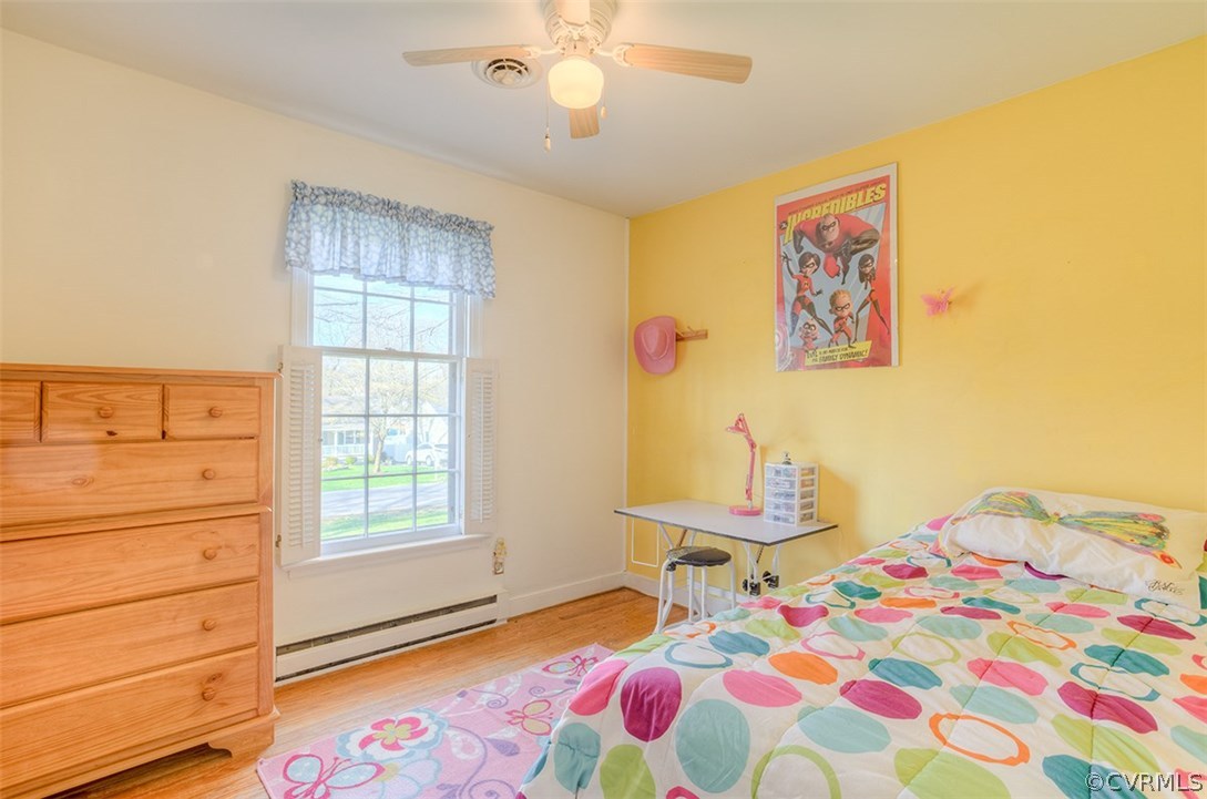 4716 Wedgemere Road Chesterfield, VA 23832 - Photo 10 of 18 a bedroom with a bed and a window