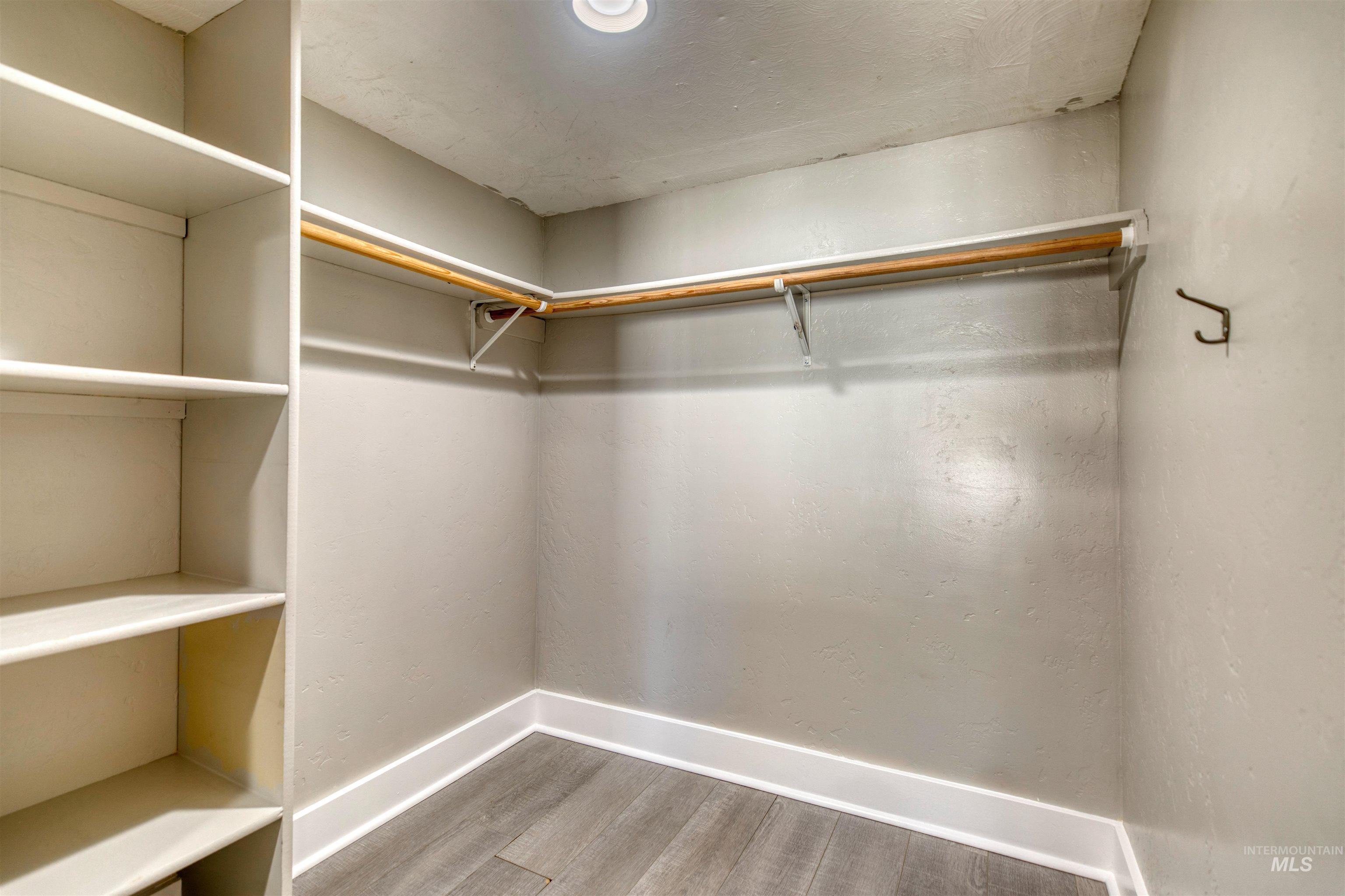3311 Hamilton Street Boise, ID 83705 - Photo 12 of 31 Walk in closet with light wood-style flooring