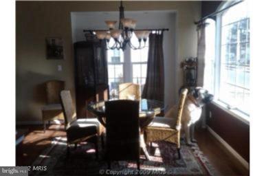 3116 Green Hill Road Sparrows Point, MD 21219 - Photo 4 of 6 a dining room with furniture and window