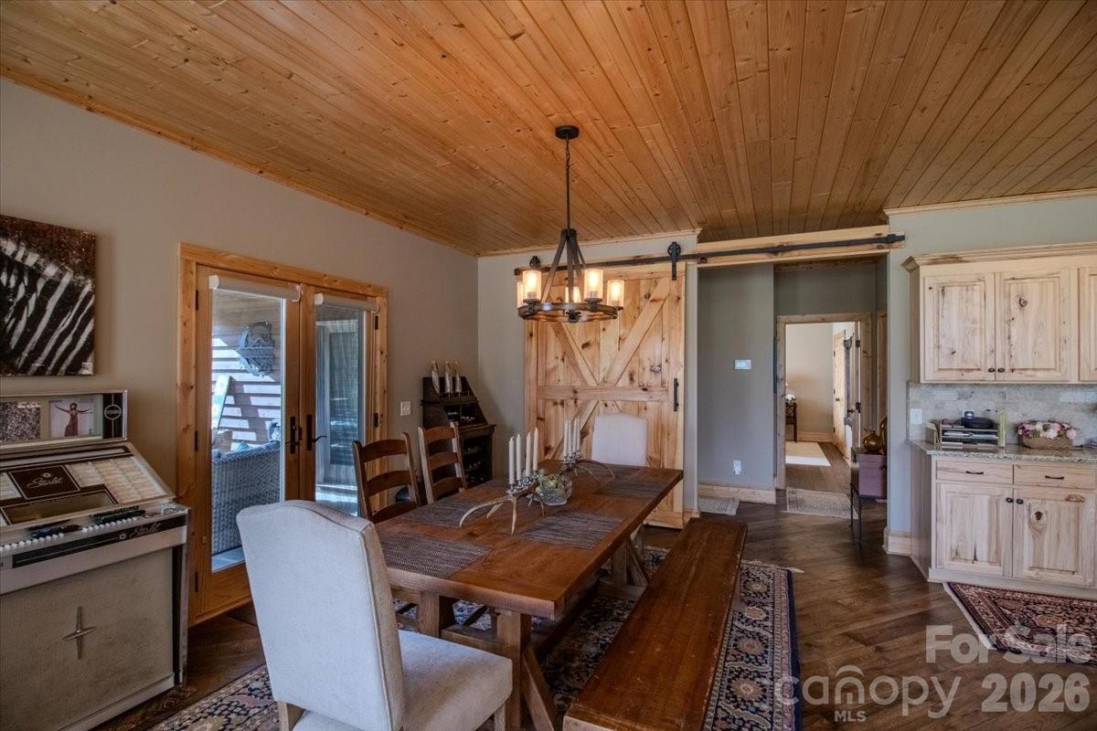 1083 Union Community Road Thurmond, NC 28683 - Photo 13 of 47 a view of a dining room with furniture window and wooden floor
