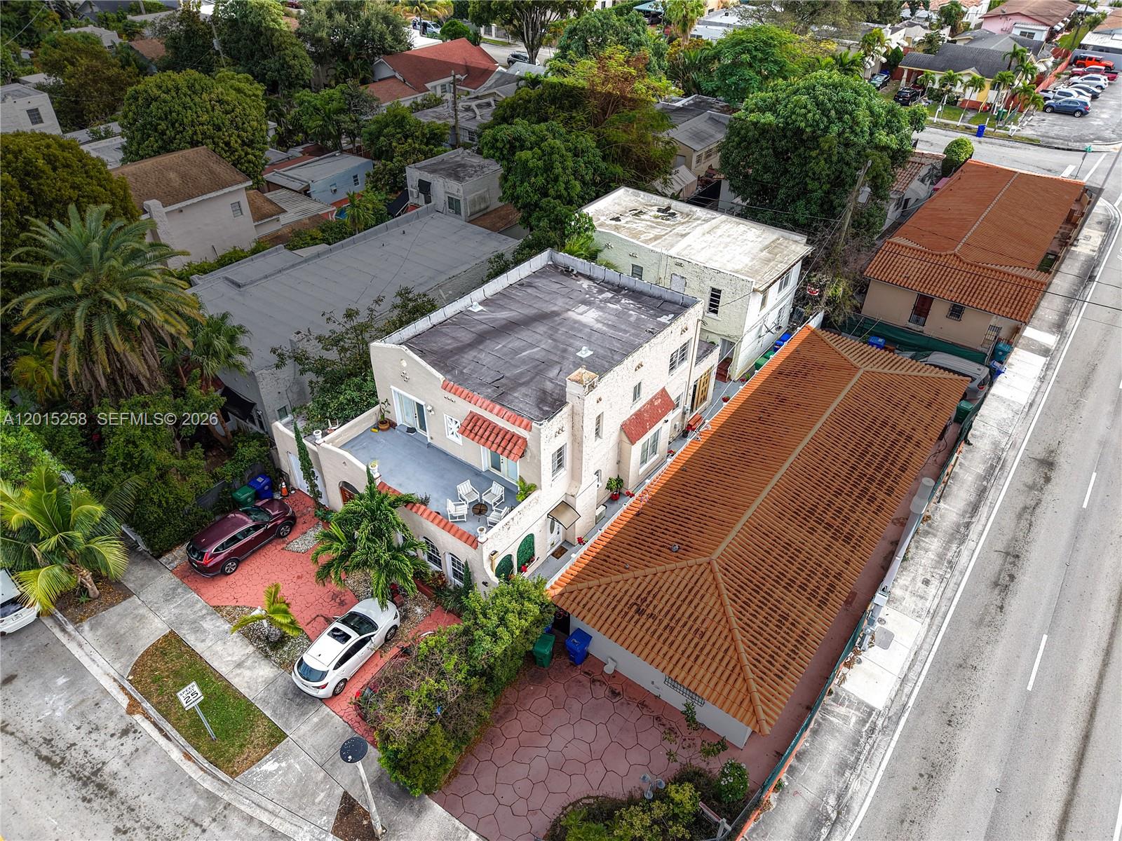 1678 Southwest 11th Street, Unit STUDIO Miami, FL 33135 - Photo 9 of 9 an aerial view of a house with a garden