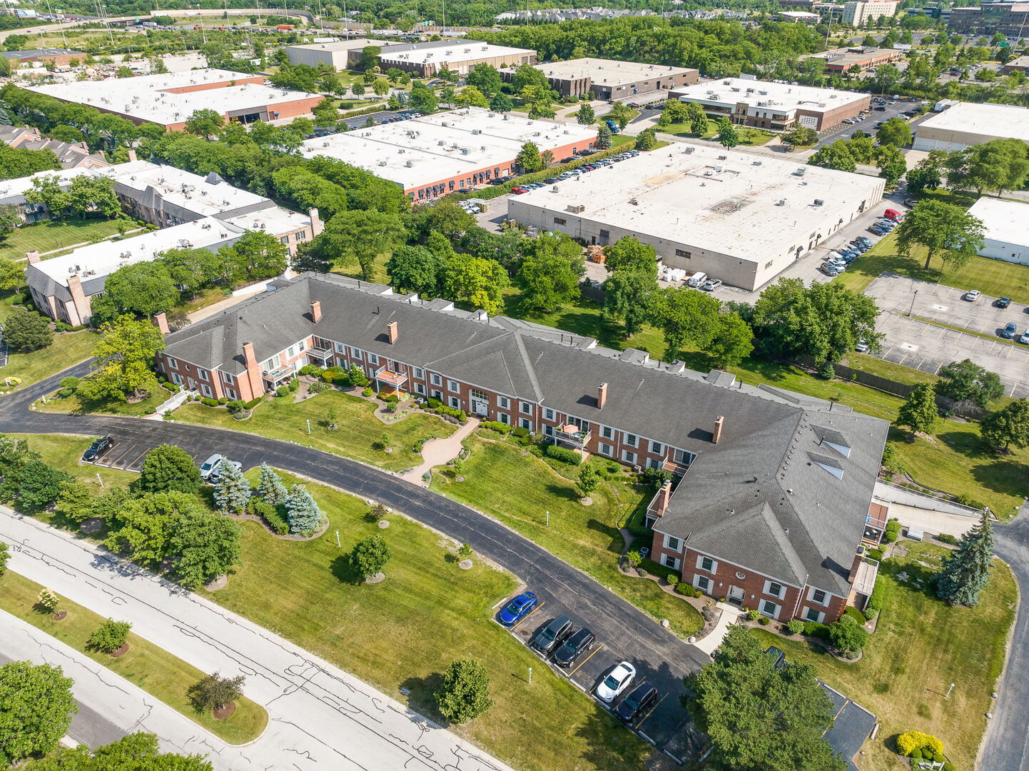 124 Carriage Way Drive, Unit B109 Burr Ridge, IL 60527 - Photo 27 of 31 an aerial view of a city