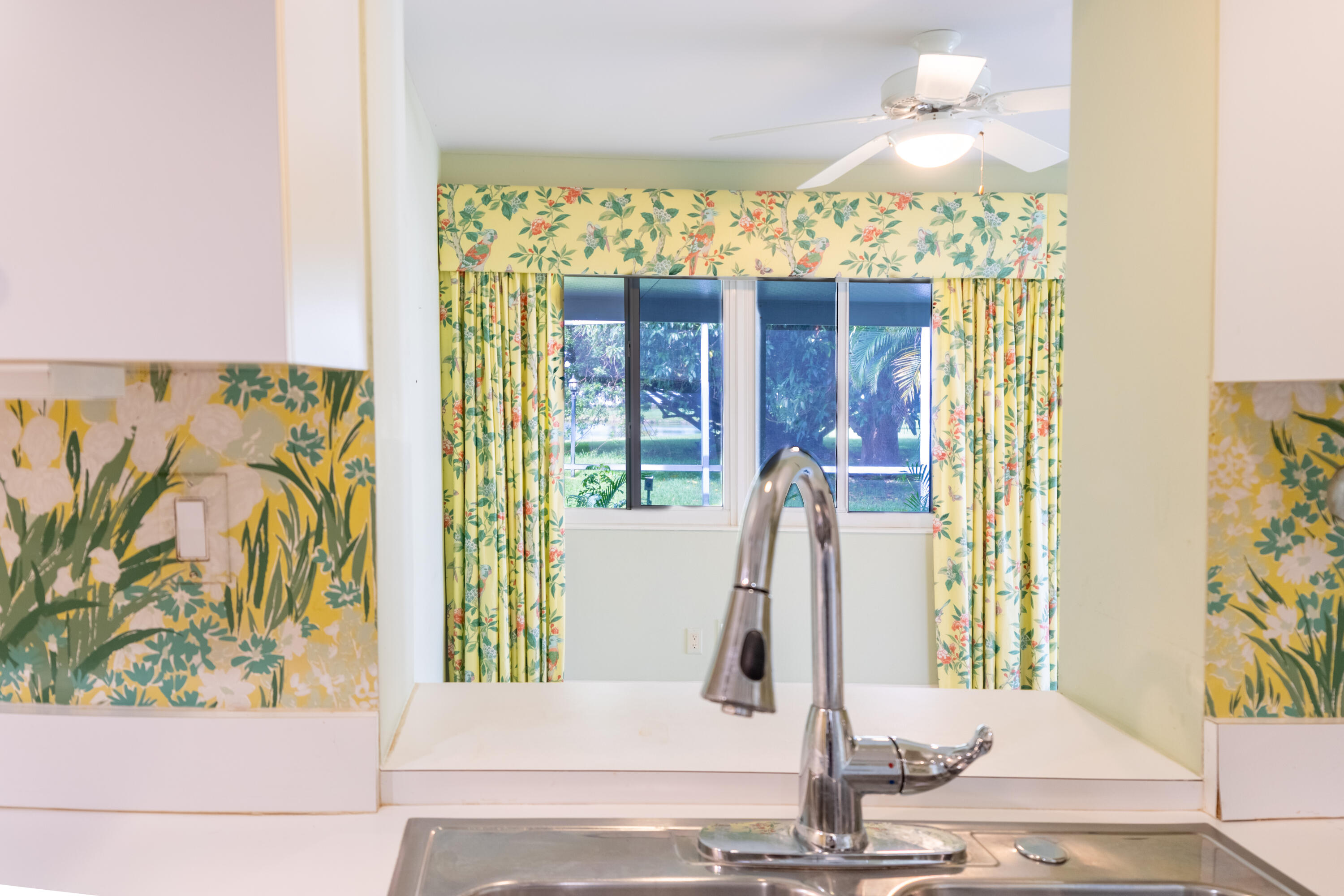 1805 Southwest Roma Way Boynton Beach, FL 33426 - Photo 4 of 28 Kitchen view to rear