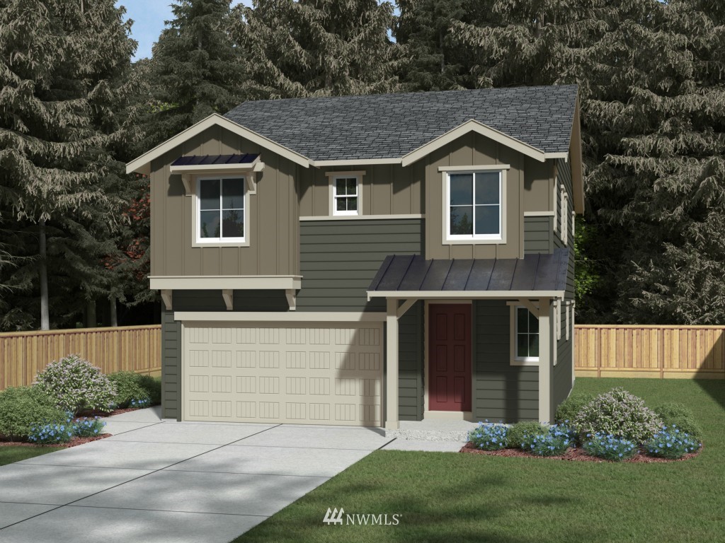 3523 176th Place Southeast, Unit 2012 Bothell, WA 98012 - Photo 1 of 1 a front view of a house with a garden and plants