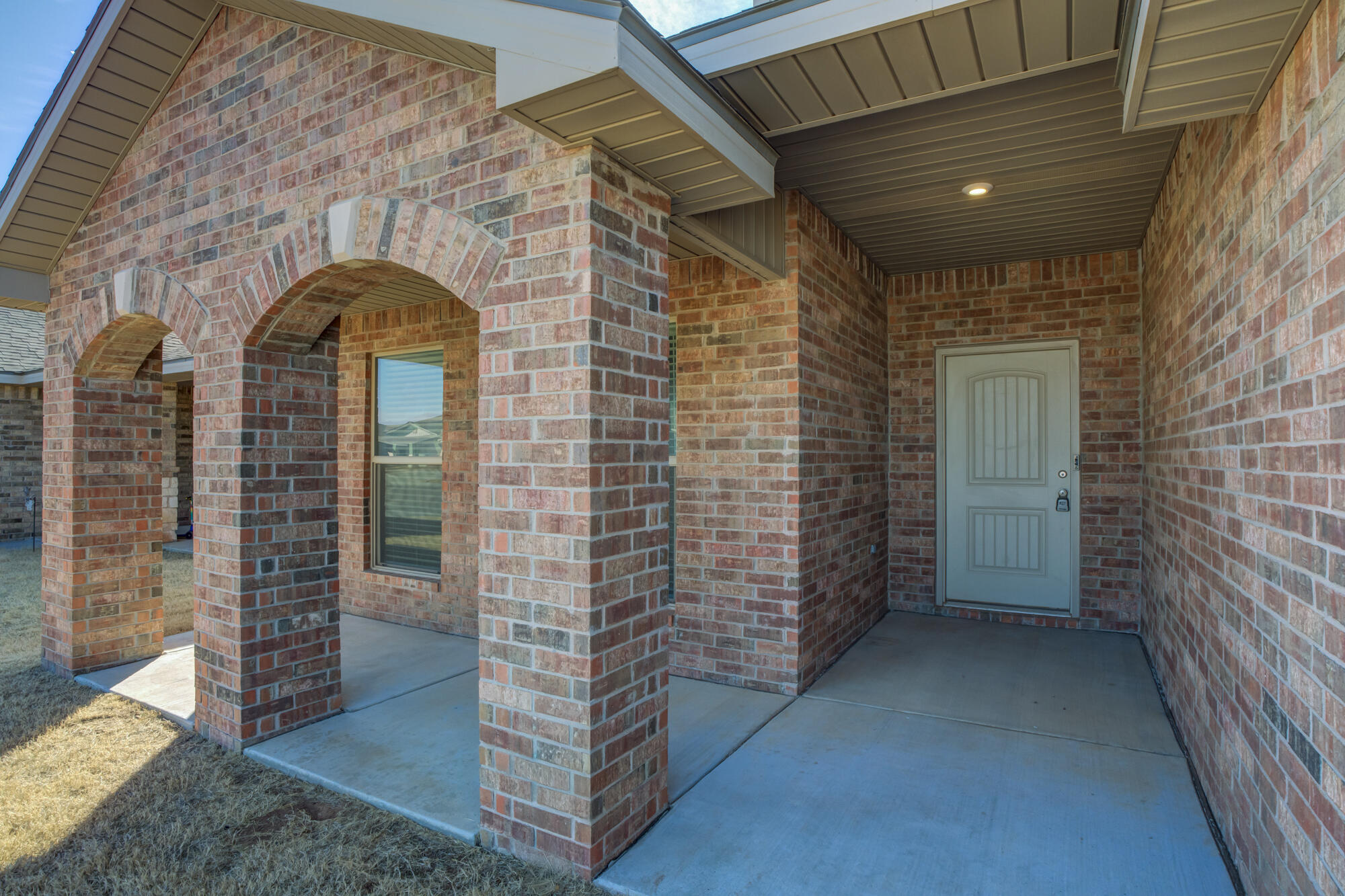 7519 101st Street Lubbock, TX 79424 - Photo 3 of 44 a view of entryway door of the house