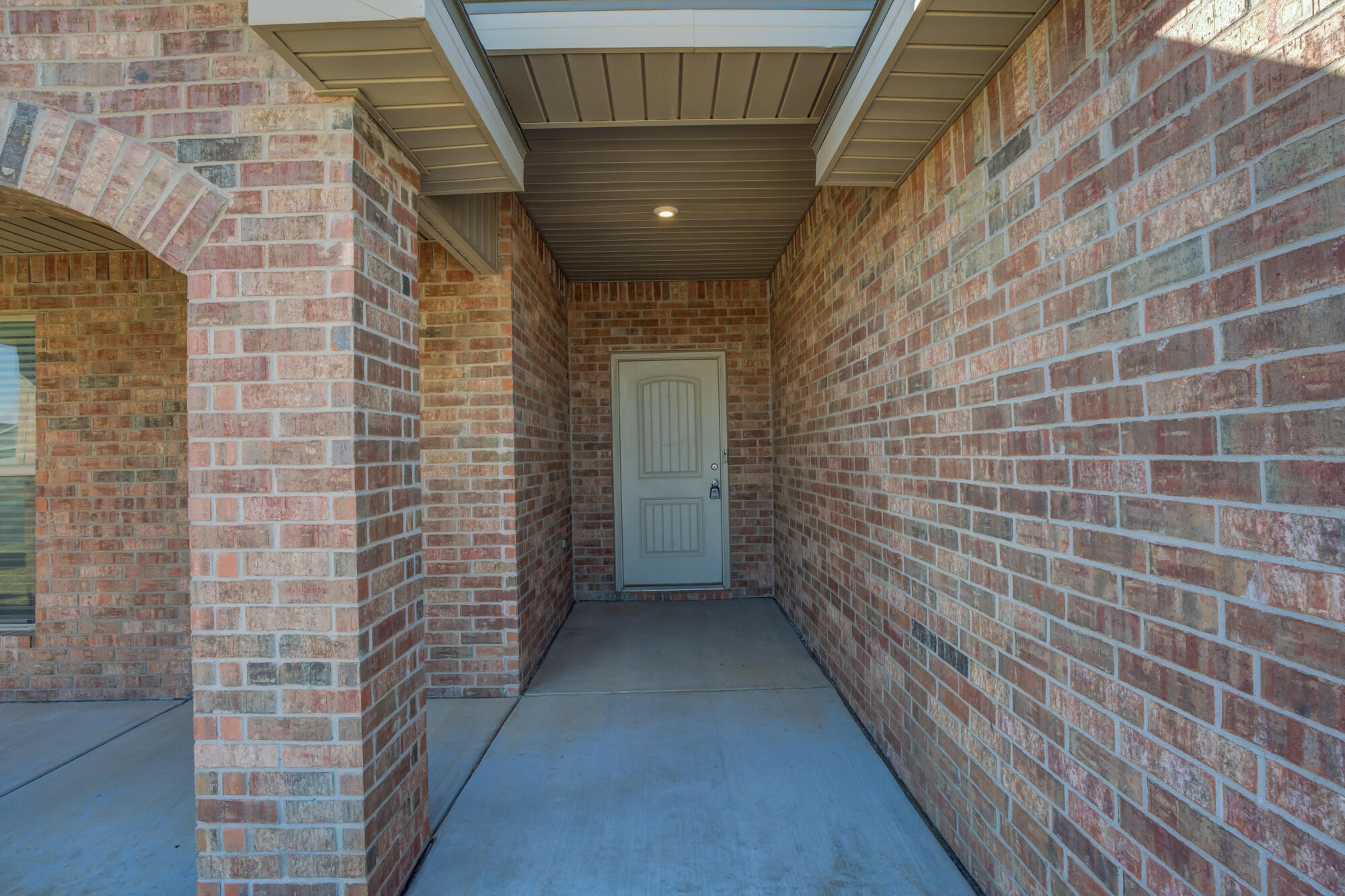 7519 101st Street Lubbock, TX 79424 - Photo 4 of 44 a view of wooden door