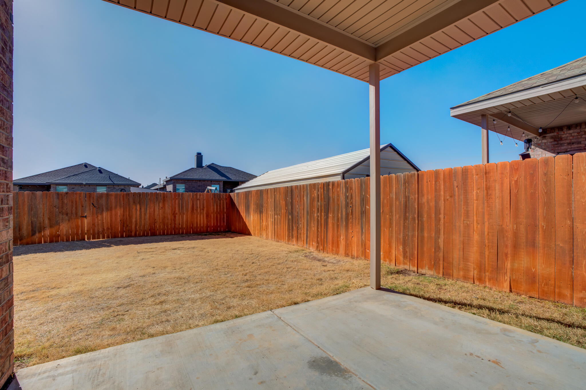 7519 101st Street Lubbock, TX 79424 - Photo 42 of 44 a view of backyard with wooden fence