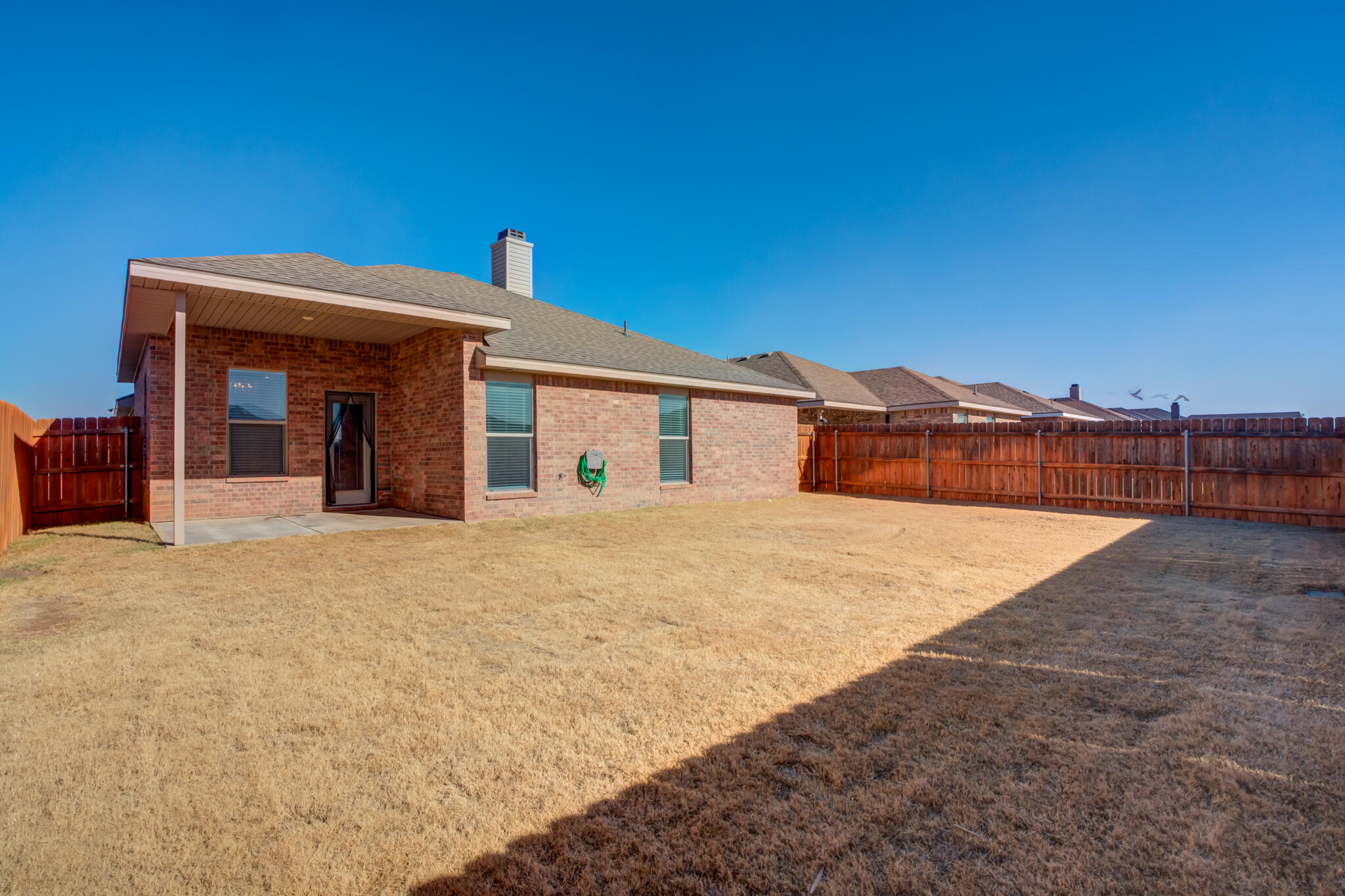 7519 101st Street Lubbock, TX 79424 - Photo 44 of 44 a very nice looking house with a large parking space