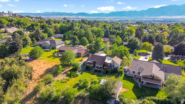 510 Spring Creek Road Providence, UT 84332 - Photo 95 of 97 Aerial perspective showcasing multiple properties nestled among mature trees