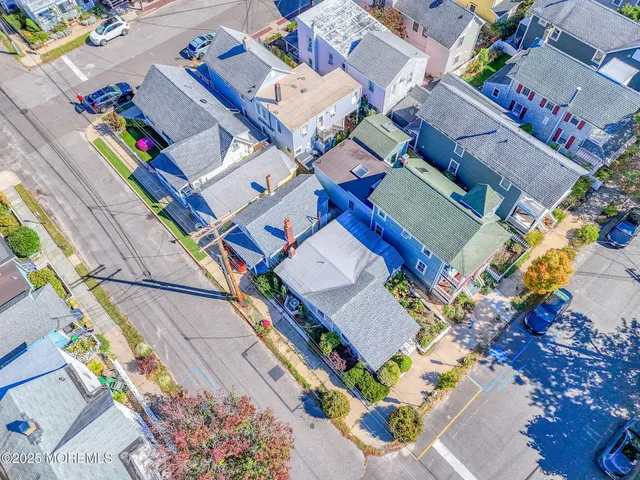 a aerial view of a house with an outdoor space