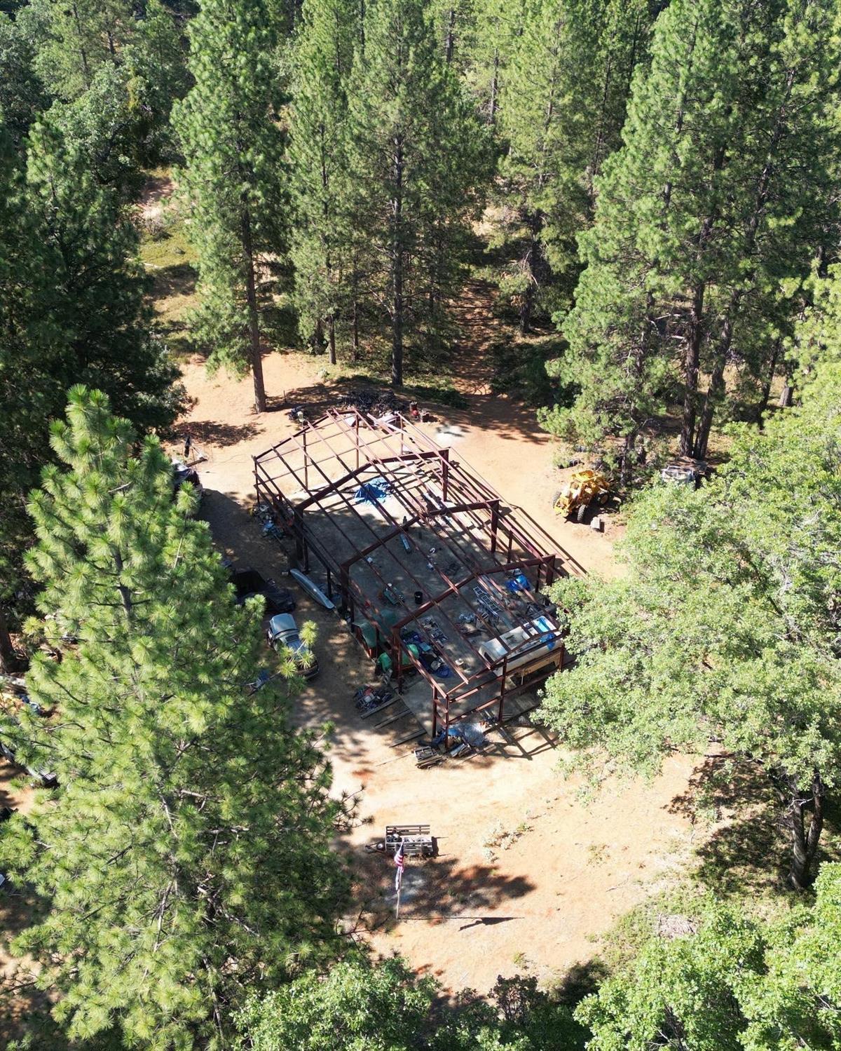 25251 Canterbury Road Pioneer, CA 95666 - Photo 13 of 35 a view of a wooden fence of a house with a yard