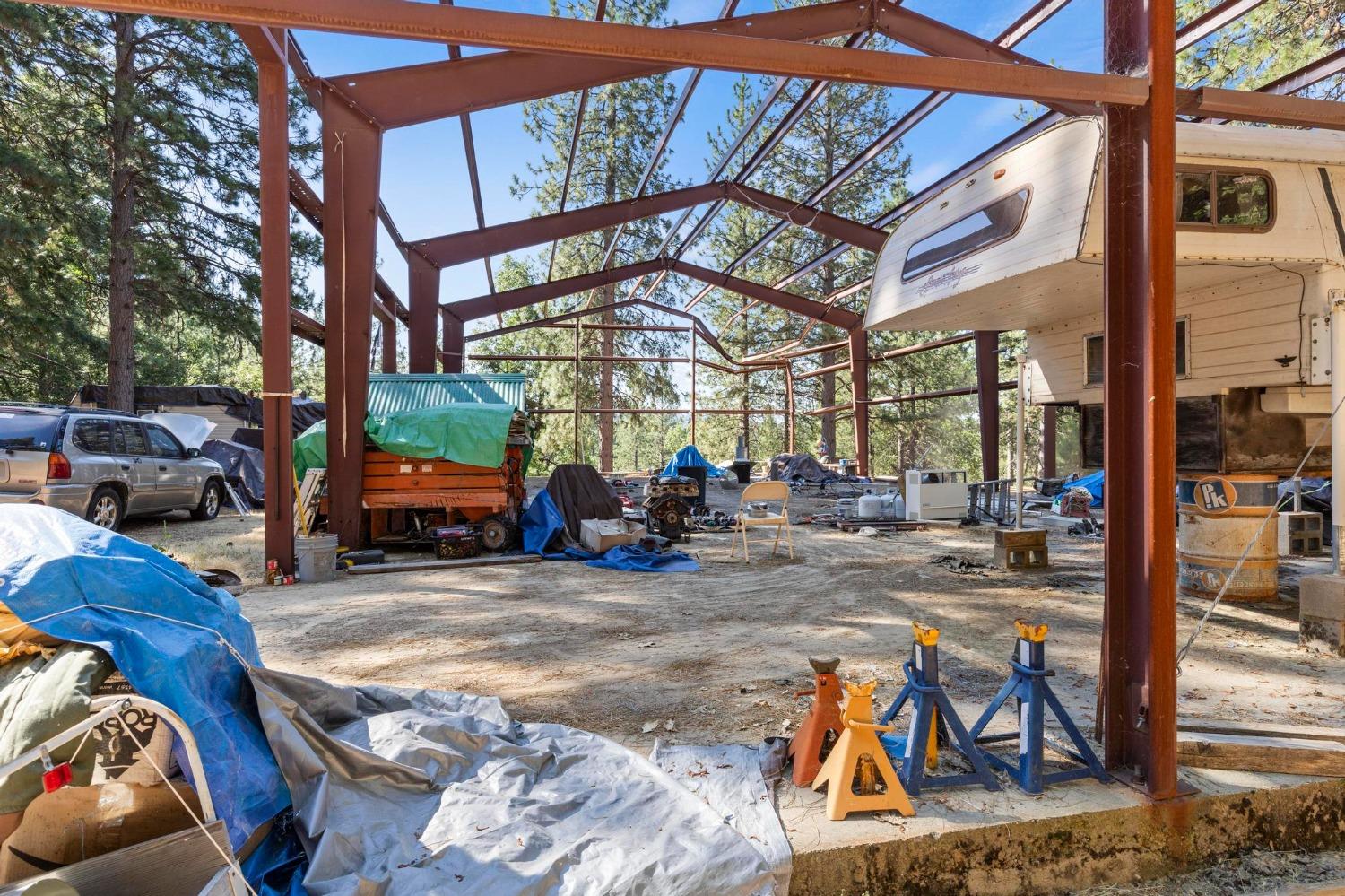 25251 Canterbury Road Pioneer, CA 95666 - Photo 19 of 35 a view of a chairs and table in a patio