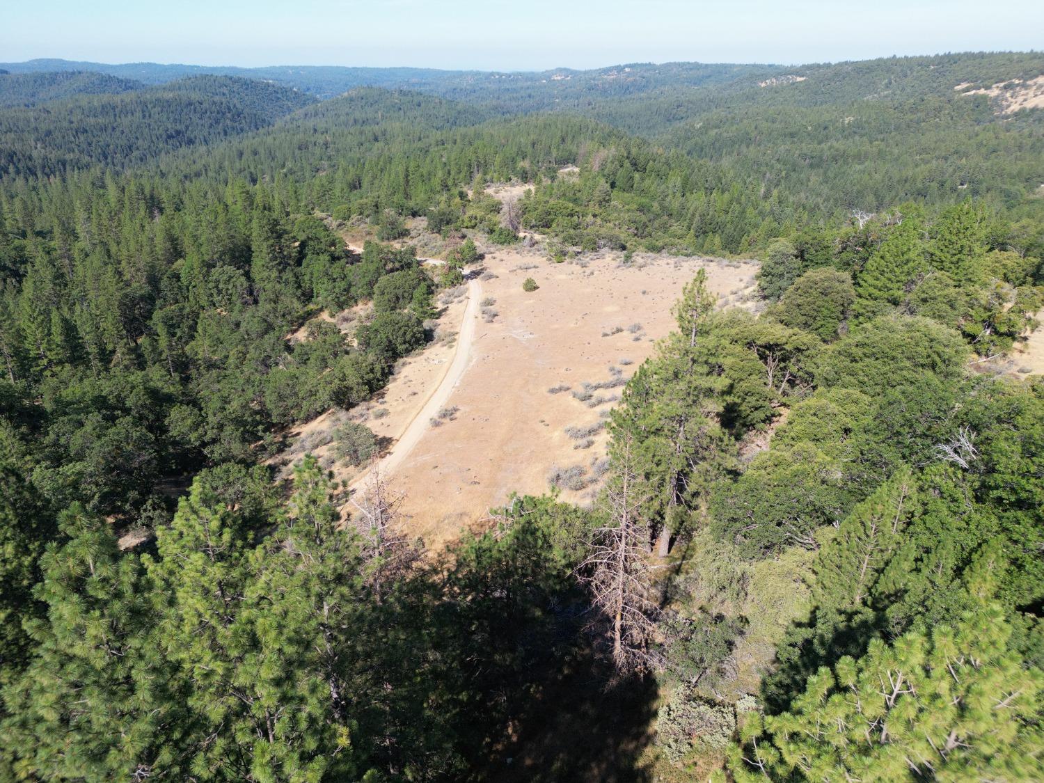 25251 Canterbury Road Pioneer, CA 95666 - Photo 10 of 35 a view of a lake with a mountain