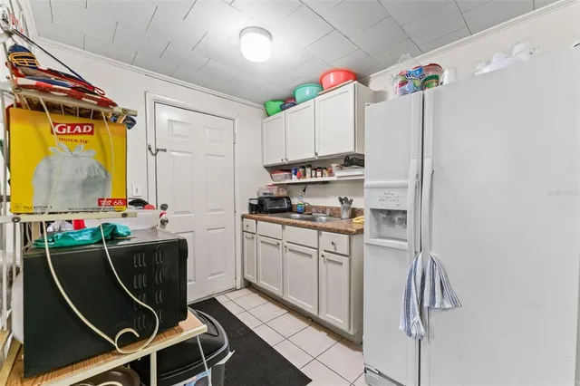 a bathroom with a sink a bath tub and a shower